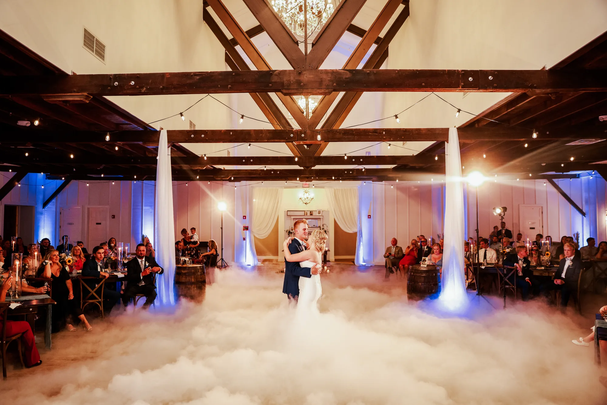 Gold infinity mirror dance floor set up outdoors under string lights in Orlando