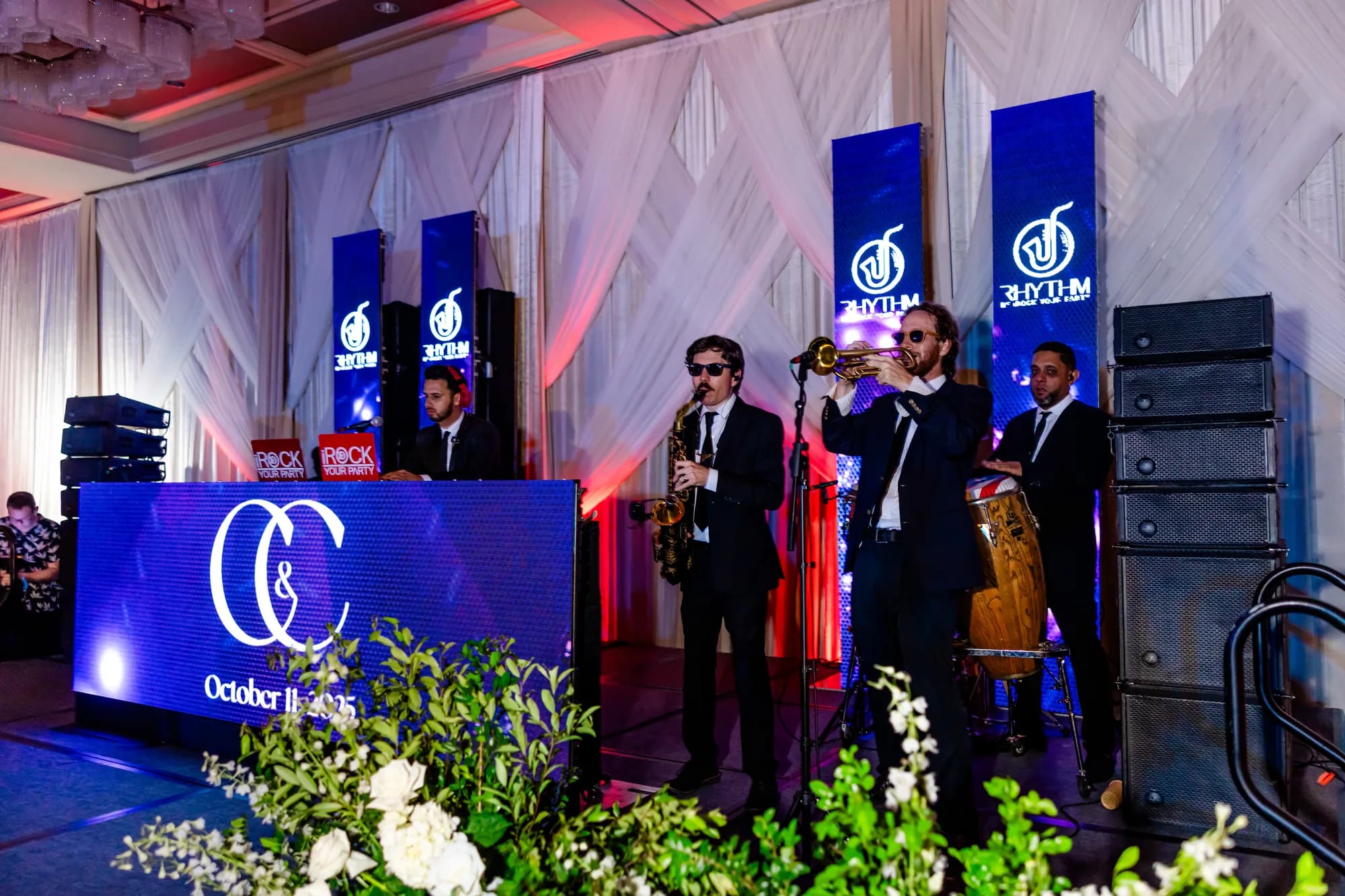 Live musicians performing alongside the DJ at an Orlando wedding reception