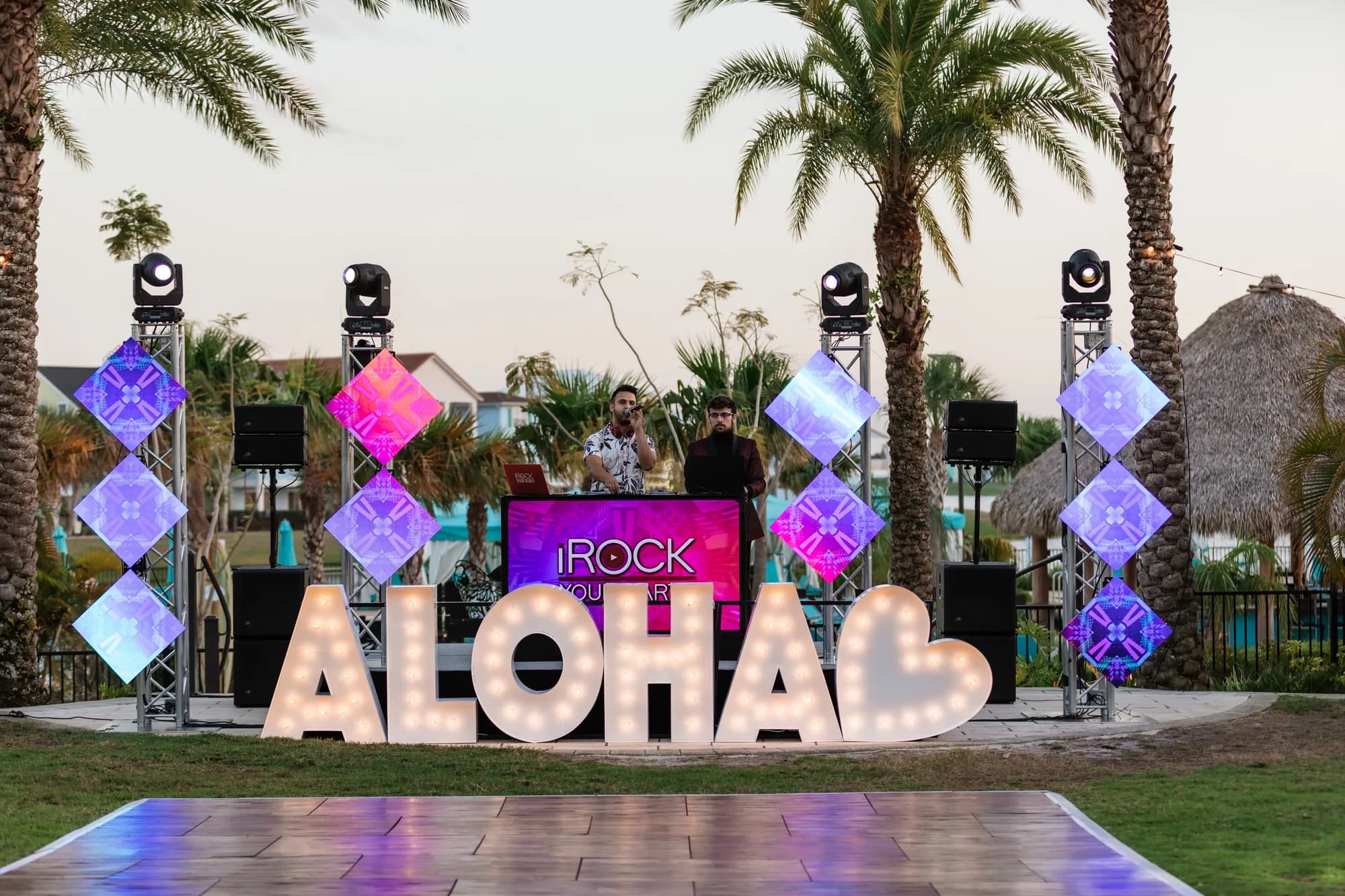 Performer in front of mapped visual content at an Orlando corporate event