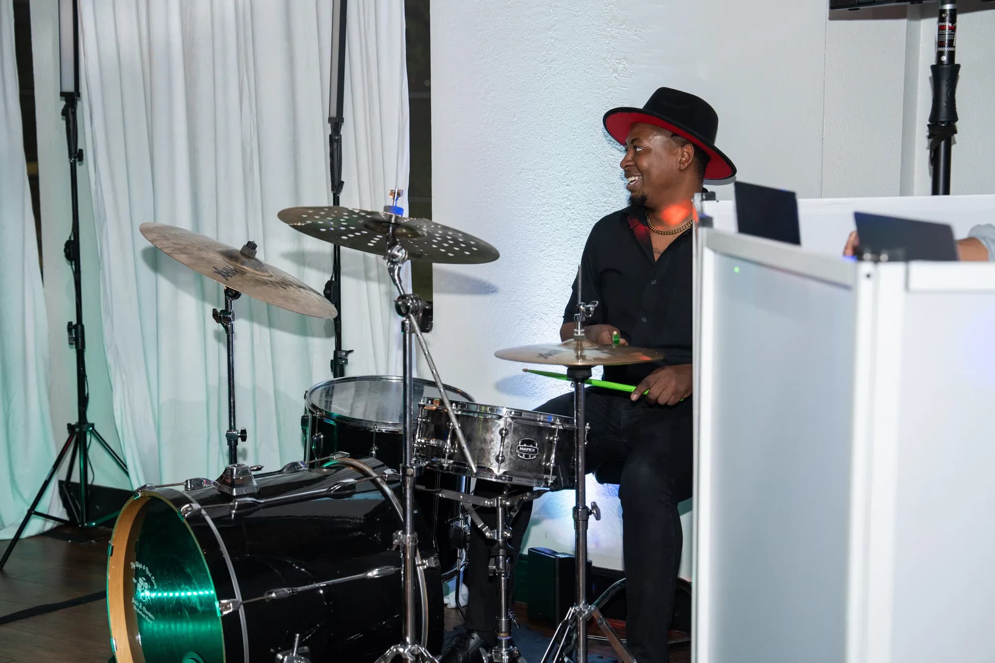 Live drummer performing with the iRock fusion band at an Orlando wedding reception