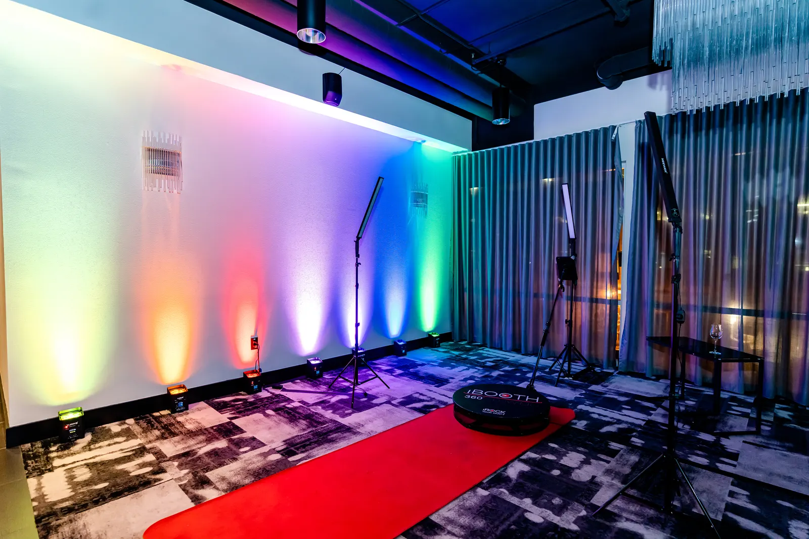 Red carpet and LED lighting surrounding the Glambot camera position
